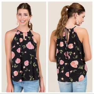 Francesca’s flowy floral tank size S